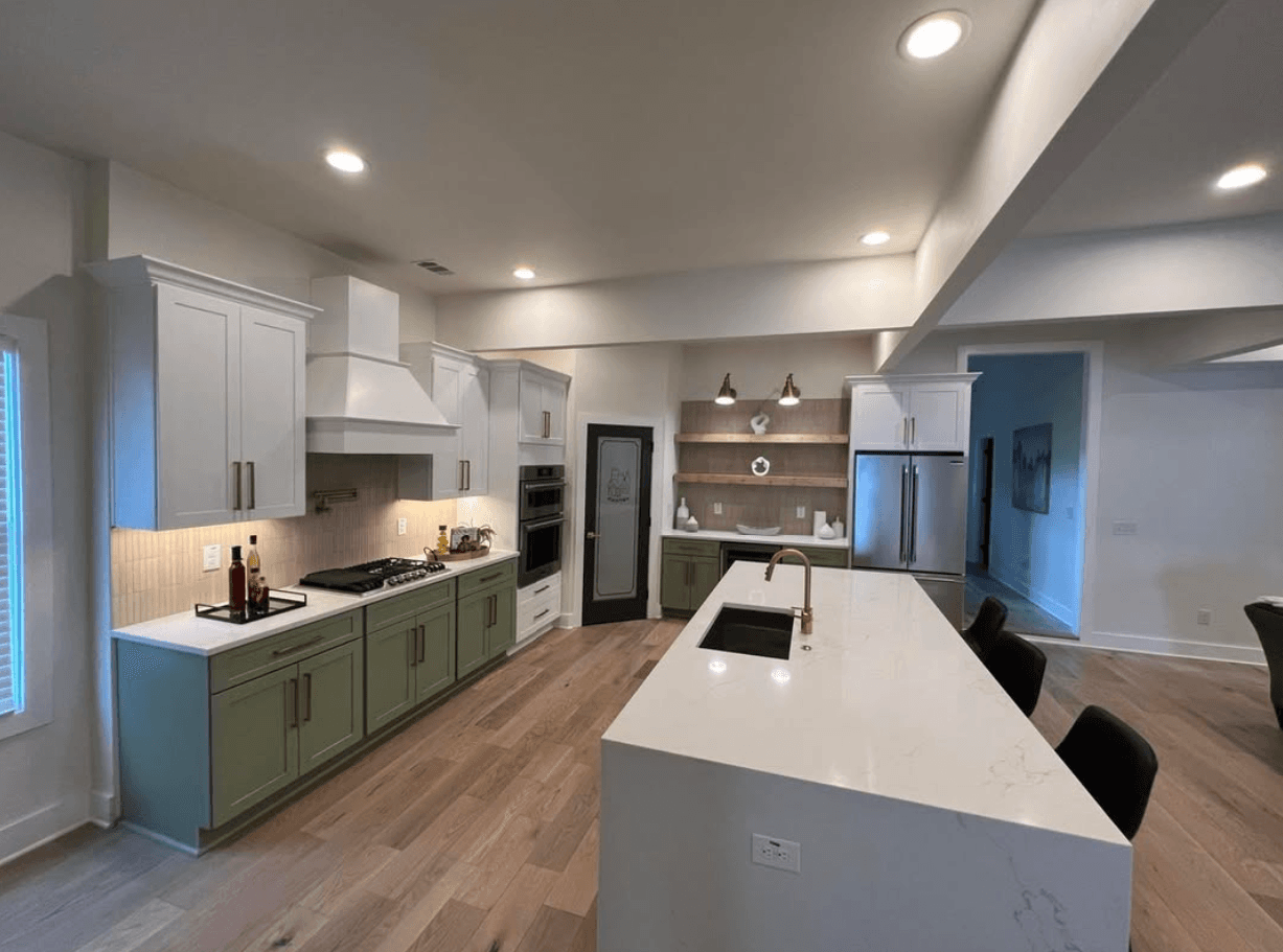 Buford, GA · White shaker kitchen with double oven and built-in microwave.
