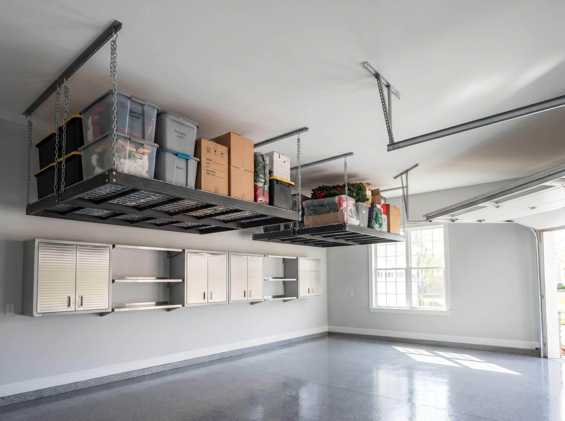 Lawrenceville, GA · Ceiling overhead platforms holding bins, stainless cabinets below.