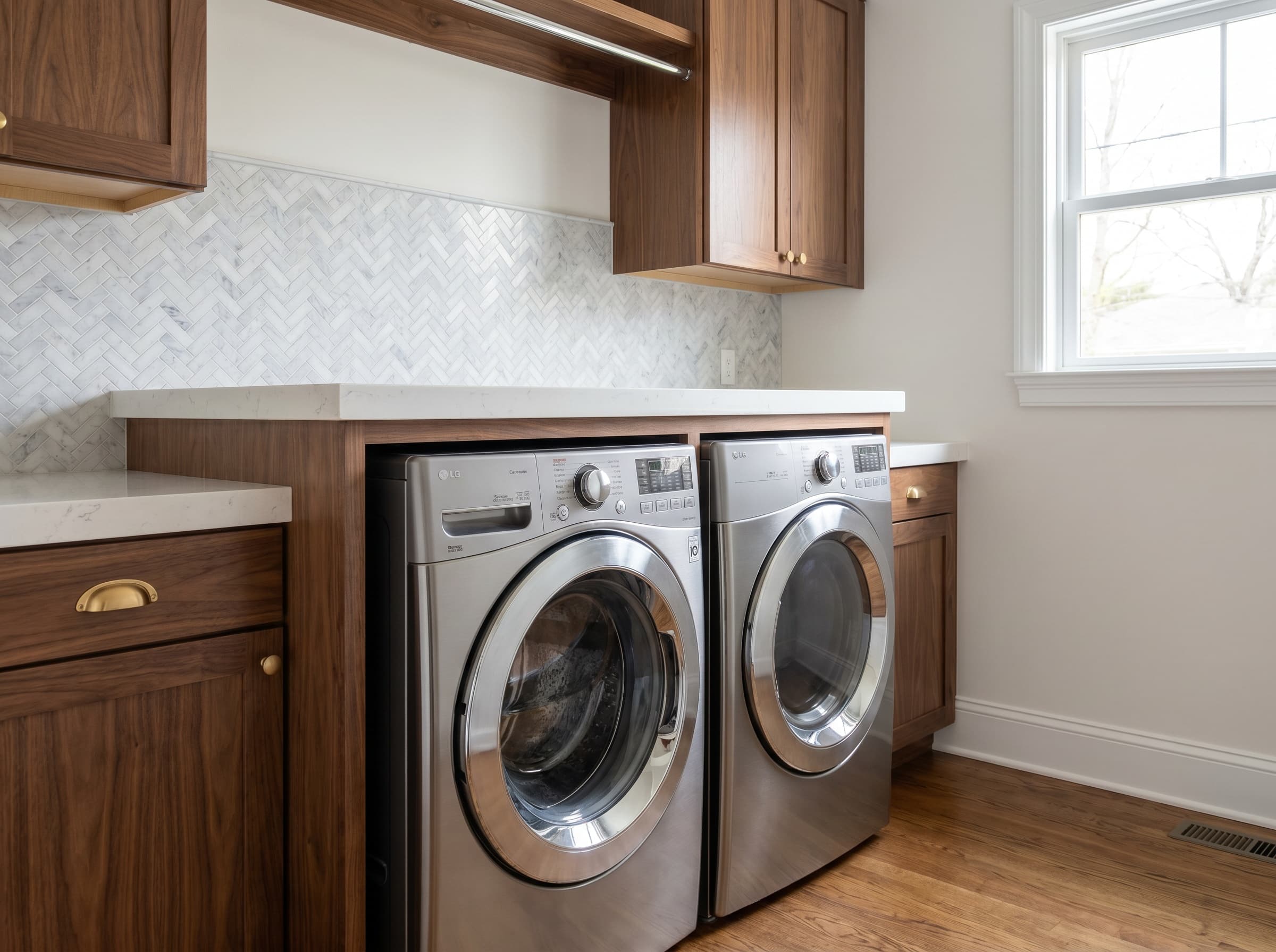 Decatur, GA · Luxury side-by-side with full walnut slab cabinetry.